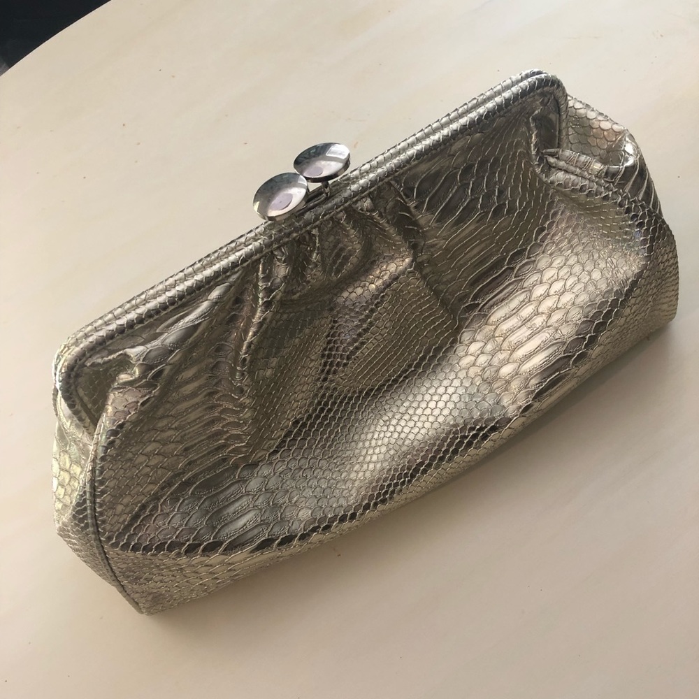 Topshop oversized gold clutch